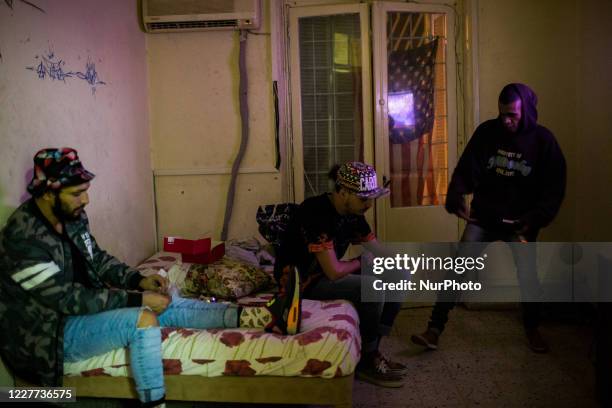 Tunis, Tunisia, 24 October 2015. Young rappers hang out in an apartment where they usually come to write their lyrics, chat and record their rap...