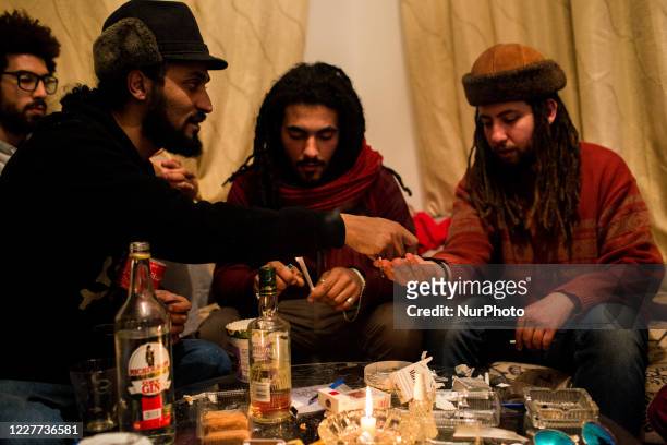 Tunis, Tunisia, 9 December 2014. A hip hop collective meets at one of their members' homes. Their subversive drinking practices and discussions force...