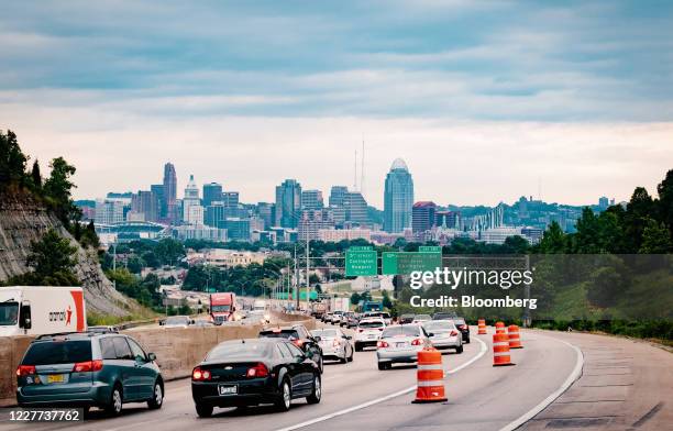 Vehicles travel along a highway in front of the Cincinnati skyline in Covington, Kentucky, U.S., on Thursday, July 16, 2020. Seventy percent of...