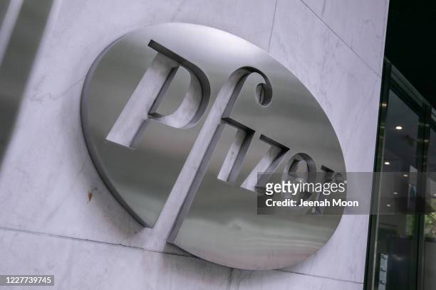 Pfizer Inc. Signage is seen on July 22, 2020 in New York City. Pfizer and German biotechnology firm BioNTech have agreed to supply the U.S....