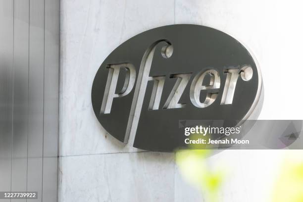 Pfizer Inc. Signage is seen on July 22, 2020 in New York City. Pfizer and German biotechnology firm BioNTech have agreed to supply the U.S....