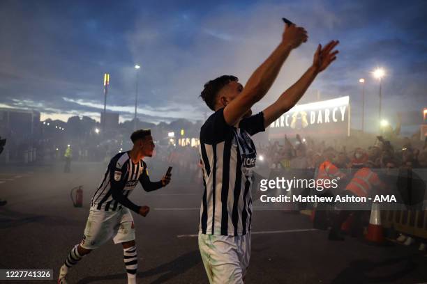 Dara OShea of West Bromwich Albion and Callum Robinson of West Bromwich Albion celebrate promotion to the Premier League with fans outside the...