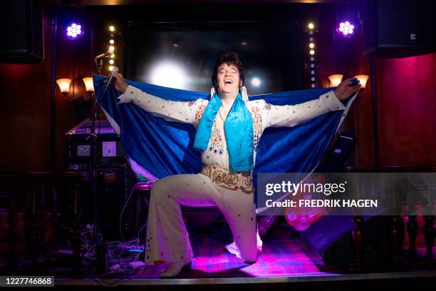 Norwegian artist Kjell Elvis performs at the start of his challenge of the world´s longest Elvis Presley singing marathon on July 23, 2020 in Oslo. -...