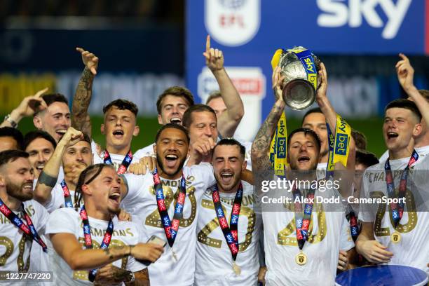 The Leeds United team celebrates becoming champions during the Sky Bet Championship match between Leeds United and Charlton Athletic at Elland Road...