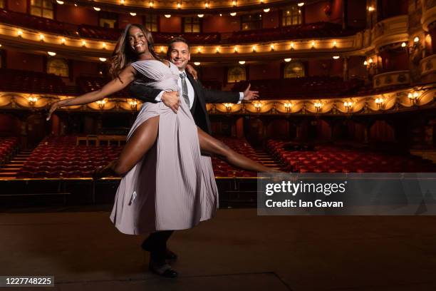 Oti Mabuse and husband Marius Lepure pose onstage at the London Coliseum on July 23, 2020 in London, England. Oti Mabuse and husband Marius Lepure...