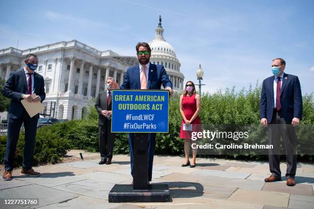 Rep. Joe Cunningham, D-S.C., joined by other lawmakers, speaks during a news conference on the Great American Outdoors Act in the Capitol in...