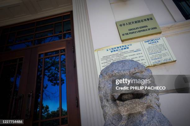 Stone lion stands outside the Consulate General of the People's Republic of China in San Francisco, California on July 23, 2020. - The US Justice...