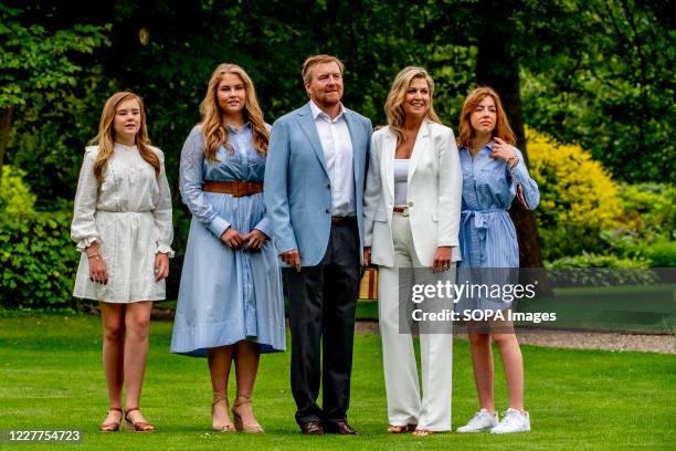 King Willem-Alexander, Queen Maxima and princesses Amalia, Alexia and Ariane are seen at the garden of Paleis Huis ten Bosch during the traditional...