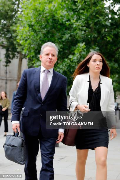 Former UK intelligence officer Christopher Steele arrives at the High Court in London on July 24 to attend his defamation trial brought by Russian...