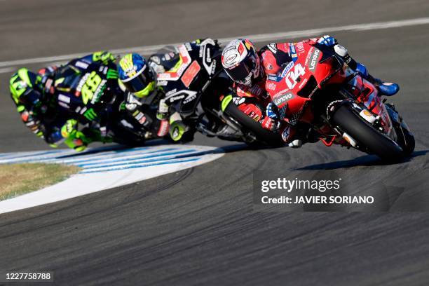 Ducati's Italian rider Andrea Dovizioso, Reale Avintia Racing's Spanish rider Tito Rabat and Monster Energy Yamaha's Italian rider Valentino Rossi...