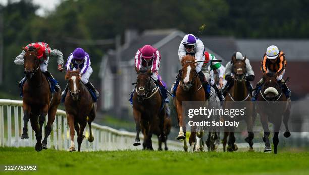Down , United Kingdom - 24 July 2020; Red Kelly, centre, with Shane Kelly up, races alongside eventual second place Sunchart, far left, with Ben Coen...
