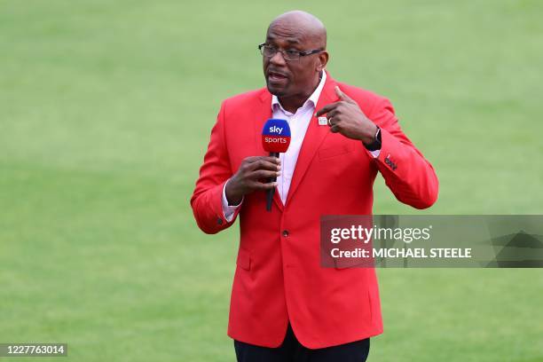 Former West Indies player and Sky TV commentator Ian Bishop wearing a red jacket for Ruth Strauss Foundation Day, speaks during the tea break of the...