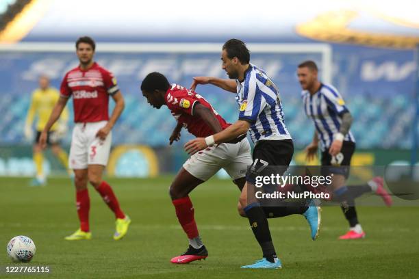 Anfernee Dijksteel of Middlesbrough in action with Atdhe Nuhiu of Sheffield Wednesday during the Sky Bet Championship match between Sheffield...