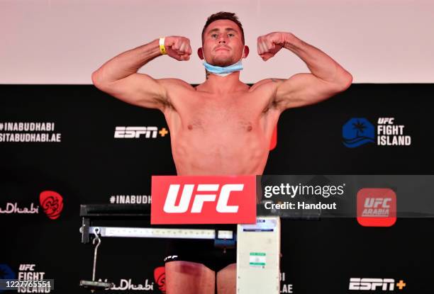 In this handout image provided by UFC, Darren Till of England poses on the scale during the UFC Fight Night weigh-in inside Flash Forum on UFC Fight...