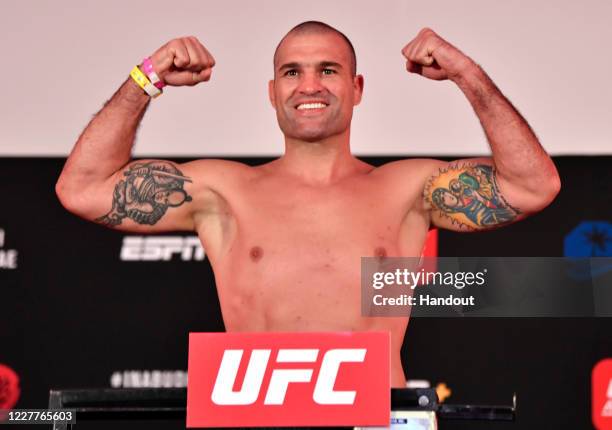 In this handout image provided by UFC, Mauricio 'Shogun' Rua of Brazil poses on the scale during the UFC Fight Night weigh-in inside Flash Forum on...