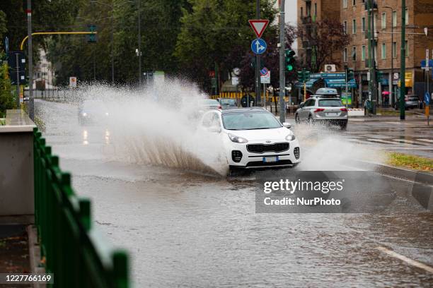 Car in high water during storm and flooding of the Seveso river on July 24, 2020 in Milan, Italy