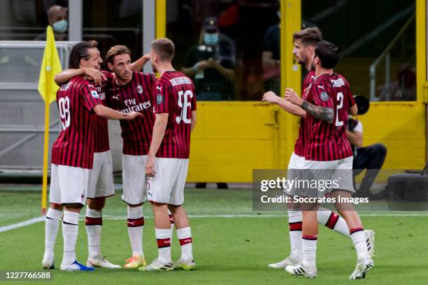 Hakan Calhanoglu of AC Milan celebrates 1-0 with Diego Laxalt of AC Milan, Matteo Gabbia of AC Milan during the Italian Serie A match between AC...