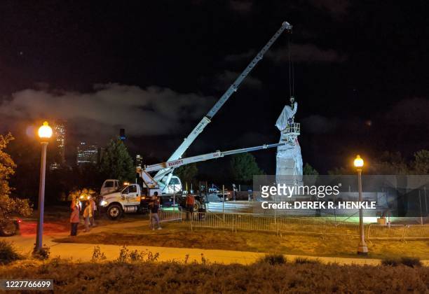 Statue of Christopher Columbus at Grant Park in Chicago is removed early on July 24, 2020. - Two statues of Christopher Columbus were taken down in...