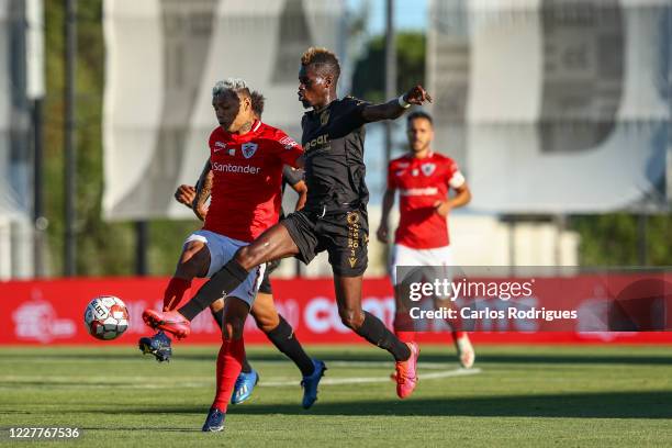 OEiRAS, PORTUGAL Carlos Junior of CD Santa Clara vies with Falaye Sacko of Vitoria SC during the Liga Nos match berween CD Santa Clara and Vitoria SC...