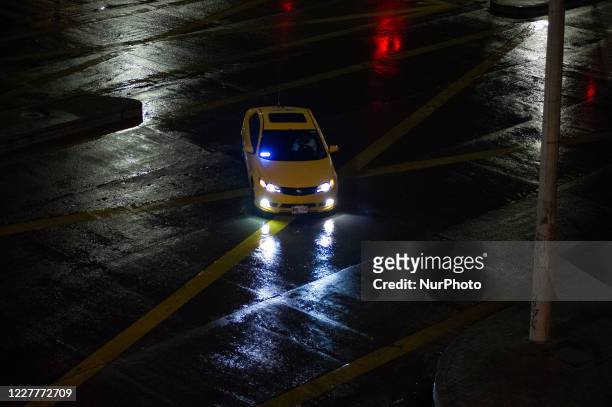 Street racers run from police soon after blocking a highway in Bogota's downtown during the lockdown caused by the novel Coronavirus pandemic in...
