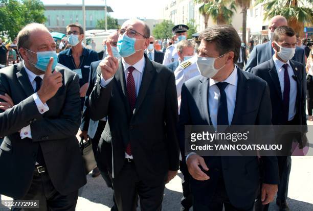 French Justice Minister Eric Dupond-Moretti, French Prime Minister Jean Castex, Nice mayor Christian Estrosi gestures as they walk in Les Moulins...