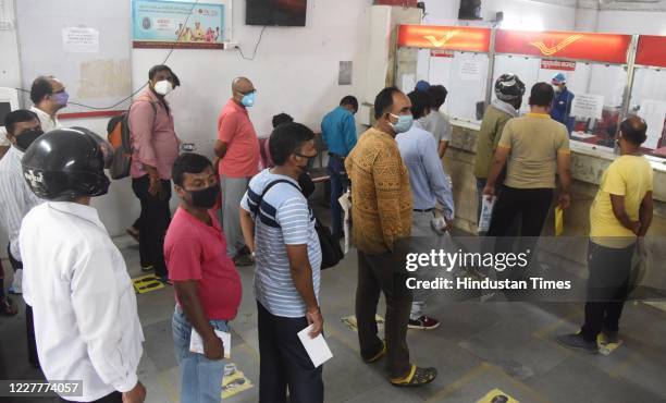 Queues of people seen at Patna General Post office ahead of Raksha Bandhan festival, on July 24, 2020 in Patna, India.