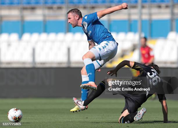 Jaromir Zmrhal of Brescia Calcio is challenged by Matteo Darmian of Parma Calcio during the Serie A match between Brescia Calcio and Parma Calcio at...