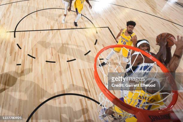 Orlando, FL Melvin Frazier Jr. #35 of the Orlando Magic drives to the basket against the Los Angeles Lakers during a scrimmage on July 25, 2020 at HP...