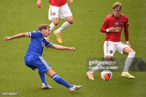 Manchester United's English defender Brandon Williams defends against Leicester City's English midfielder Marc Albrighton during the English Premier...