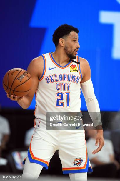 Orlando, FL Andre Roberson of the Oklahoma City Thunder handles the ball during the game against the Philadelphia 76ers during a scrimmage on July...