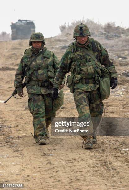 Military engineers execution of duty their order during an joint drill near DMZ in Paju, South Korea, on March 9, 2003.