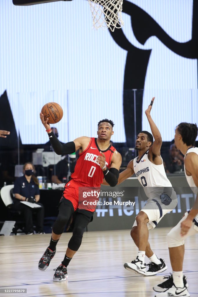 Russell Rockets Basketball Russell Westbrook of the Houston Rockets drives to the basket against ...