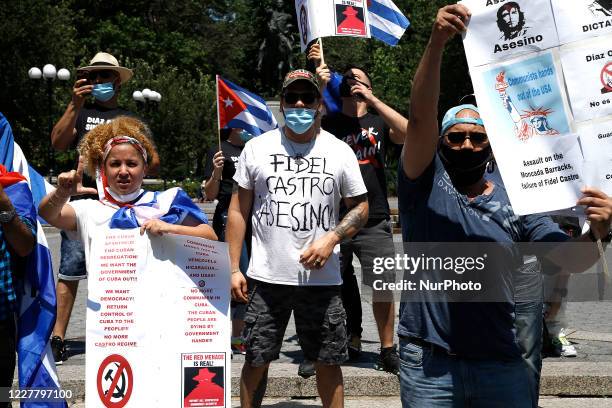 Demonstrators rally in Union Square against US economic and travel sanctions against Cuba, in New York City on July 26, 2020. Protesters against the...