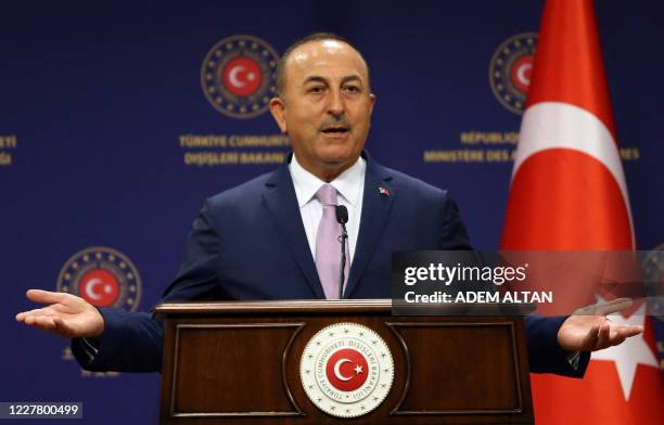 Turkish Foreign Affairs Minister Mevlut Cavusoglu speaks during a joint press conference with his Spanish counterpart following their meeting at the...