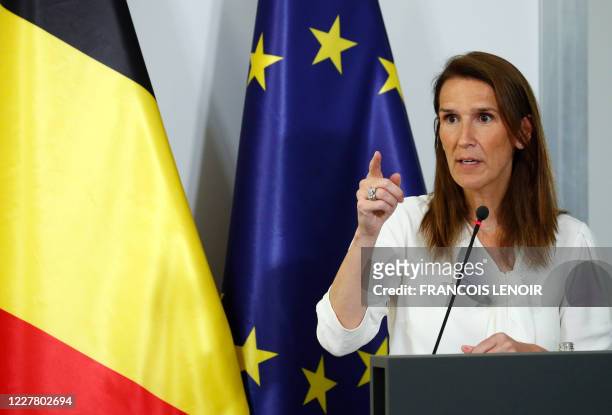 Belgian Prime Minister Sophie Wilmes addresses a press conference after a meeting of the National Security Council, consisting of politicians and...