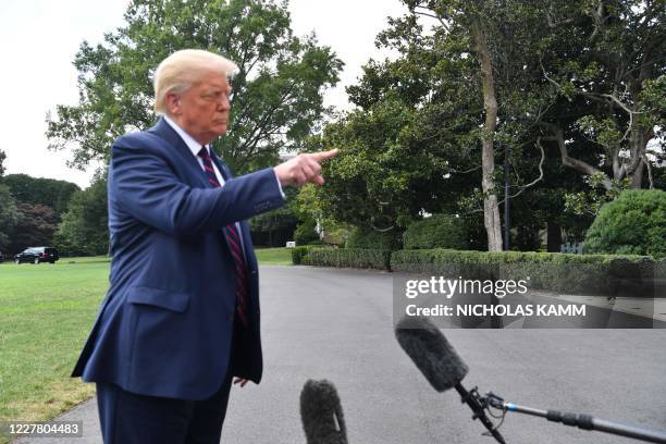 President Donald Trump speaks to the press before departing from the White House in Washington,DC on July 27 en route to Morrisville, North Carolina.