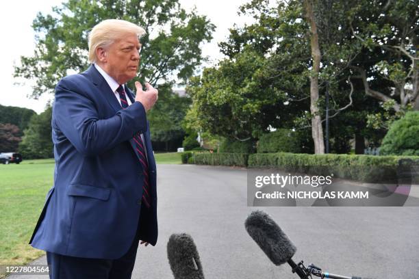 President Donald Trump speaks to the press before departing from the White House in Washington,DC on July 27 en route to Morrisville, North Carolina.