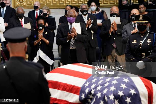 Rep. Sheila Jackson Lee looks on as the flag-draped casket of the late Rep. John Lewis lies in state in the Capitol Rotunda on July 27, 2020 in...