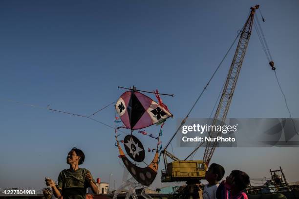 Kids prepares to fly a kite amid the spread of the coronavirus outbreak in Jakarta, Indonesia on July 27, 2020. According to The Indonesian...