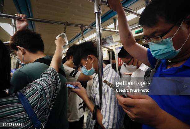 The daily routine of citizens who travel using the underground service MRT during peak hours in the evening in the capital, under the Covid-19...