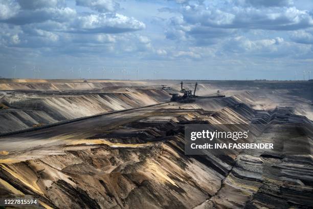 Bucket wheel excavator is seen at the Garzweiler coal mine, western Germany, on July 28, 2020. - Lost in the countryside of western Germany, the...