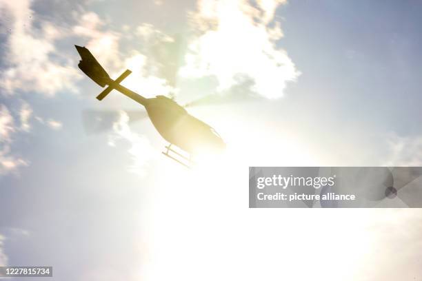 July 2020, Saxony-Anhalt, Burg: A police helicopter brings the right-wing extremist assassin from Halle back from the court hearing in Magdeburg to...