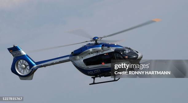 Stephan Balliet is transported by police in a helicopter after the third day of his trial on July 28, 2020 in Magdeburg, eastern Germany. Stephan...