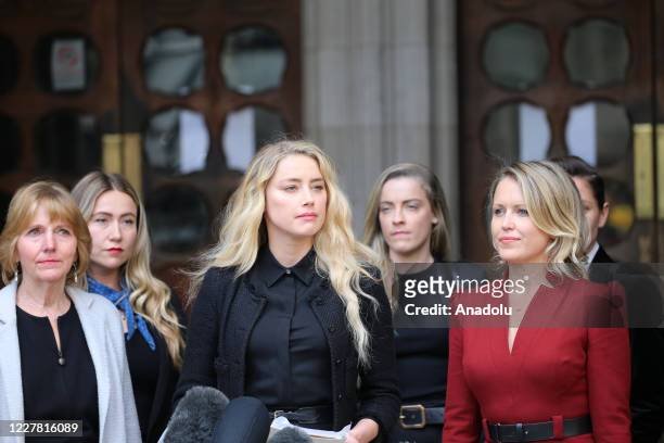 American actress Amber Heard makes a statement outside the Royal Courts of Justice in London, England on July 28, 2020.