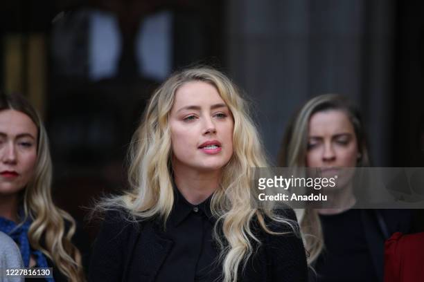 American actress Amber Heard makes a statement outside the Royal Courts of Justice in London, England on July 28, 2020.