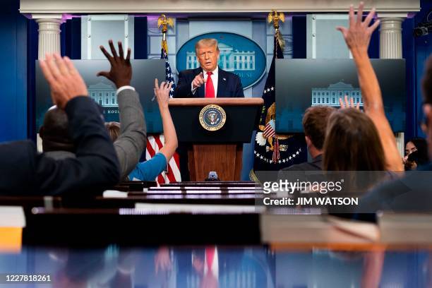 President Donald Trump speaks to the press in the Brady Briefing Room of the White House in Washington, DC, on July 28, 2020.