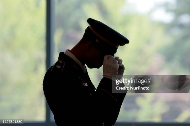 July 27, 2019-Paju, South Korea-UNC Honor Guard adjust cap with standby for Armistice event during a Commemorative Ceremony for the 66th anniversary...