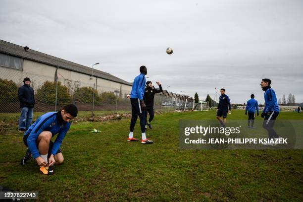 Gueugnon's players attend a training session in Gueugnon, eastern France, on February 28, 2020. - Nicknamed Les Forgerons , the football club of...