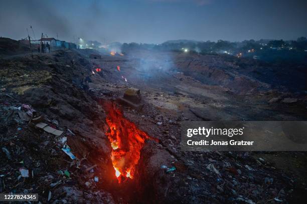 In the village Liloripathra that is located on the top of Jharia coal field, large cracks in the earth's crust expose glow from the fires beneath....