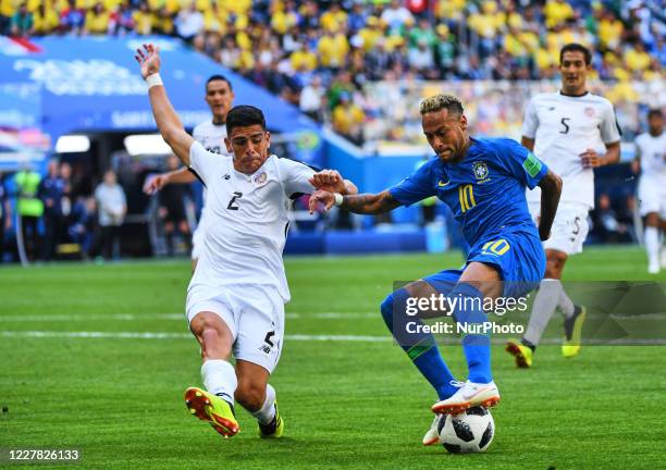 Neymar of Brazil going past Johnny Acosta of Costa Rica during the FIFA World Cup match Brazil versus Costa Rica at Saint Petersburg Stadium, Saint...